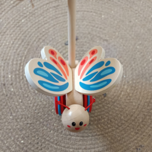 Jouet en bois papillon à pousser